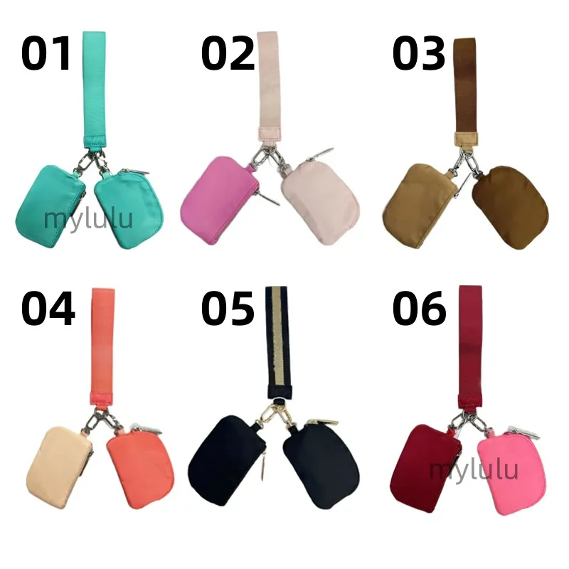 New Womens Dual Key Pouch Blutch Bag Diseñador de billetera Billetera Tiestra de carteras de monedas de monedas de lona lienzo d