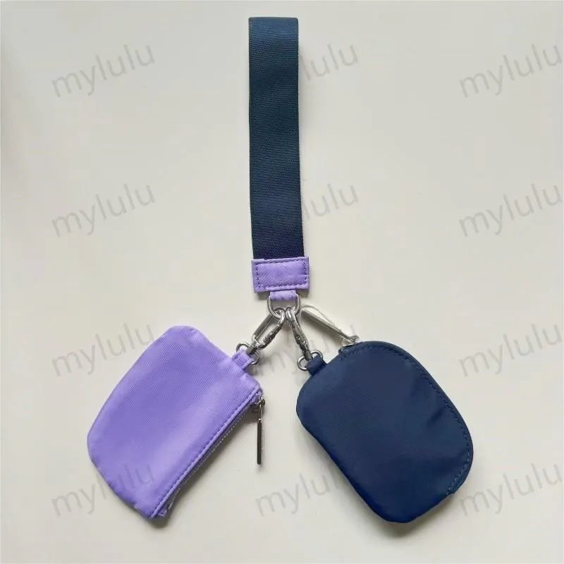 New Womens Dual Key Pouch Blutch Bag Diseñador de billetera Billetera Tiestra de carteras de monedas de monedas de lona lienzo d