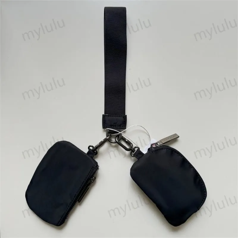 New Womens Dual Key Pouch Blutch Bag Diseñador de billetera Billetera Tiestra de carteras de monedas de monedas de lona lienzo d