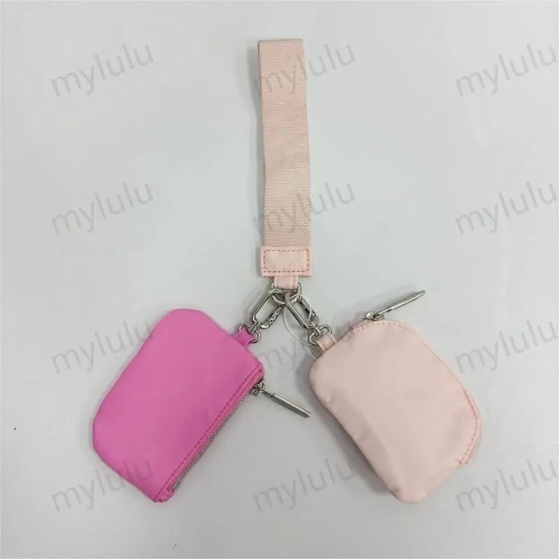 New Womens Dual Key Pouch Blutch Bag Diseñador de billetera Billetera Tiestra de carteras de monedas de monedas de lona lienzo d