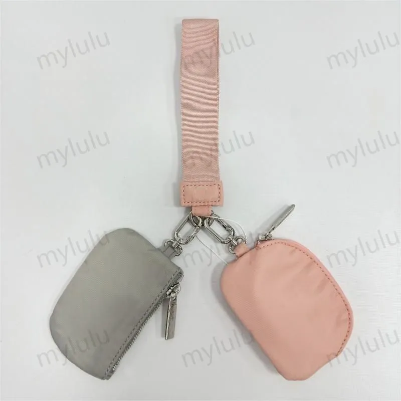 New Womens Dual Key Pouch Blutch Bag Diseñador de billetera Billetera Tiestra de carteras de monedas de monedas de lona lienzo d