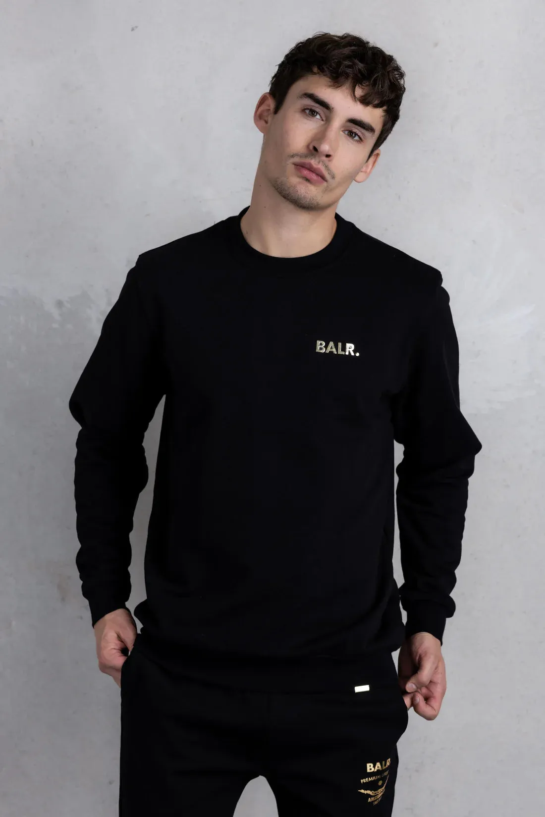 SUDADERA OLAF STRAIGHT GOLD DOLL NEGRA